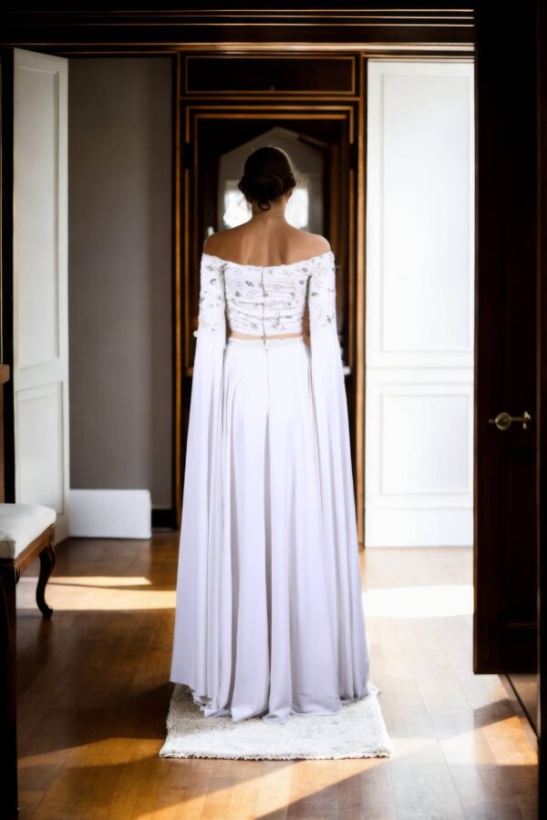 Regal Allure: White Satin Circular Flared Gown with Beaded Illusion Neckline, Net Full Sleeves, Pearl & Sequin Embellishments, and Cowl Draped Front - Image 3