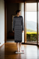 Stylish Black Knitted Top - Straight Fit with Round Neckline, Full Sleeves & White Horizontal Line Design
