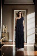 Black Net One-Shoulder Gown with Stretch Design, Ruffled Draped Detailing, and Front Slit - Elegant Evening Wear
