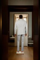Luxurious Tea Green Suiting Suit with Notched Lapel Collar, Front Open Full Sleeves, Three Pockets & Formal Pants - Perfect for Stylish & Formal Occasions