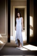 White Net Gown with Abstract Sequin Design & V-Neckline - Perfect for Sophisticated Evenings