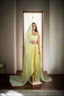 Elegant Light Yellow Raw Silk Indo-Western Draped Saree with Beaded Belt, Spaghetti Strap Blouse & Plain Dupatta - Perfect for Weddings & Special Occasions