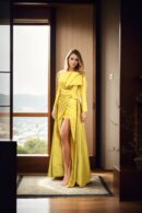 Stunning Yellow Silk Western Gown with Short Length, Draping & Pleated Design, Full Sleeves, Off-Shoulder, and Long Trail Details - Perfect for Glamorous Evenings & Special Occasions