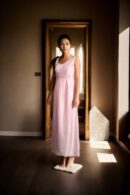 Stylish Baby Pink Silk Western Dress with Front Drape Design, Sleeveless Silhouette, Round Neckline & Princess-Cut Detailing
