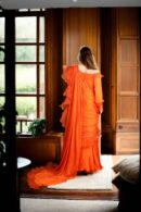 Stunning Orange Long Trail Gown with Waist Drape, Intricate Ruffle Work, Square Neckline & Full Sleeves
