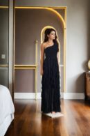 Black Net One-Shoulder Gown with Stretch Design, Ruffled Draped Detailing, and Front Slit - Elegant Evening Wear