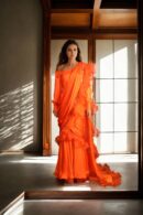 Stunning Orange Long Trail Gown with Waist Drape, Intricate Ruffle Work, Square Neckline & Full Sleeves