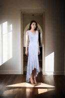White Net Gown with Abstract Sequin Design & V-Neckline - Perfect for Sophisticated Evenings