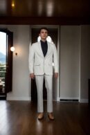 Luxurious Tea Green Suiting Suit with Notched Lapel Collar, Front Open Full Sleeves, Three Pockets & Formal Pants - Perfect for Stylish & Formal Occasions