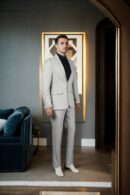 Luxurious Tea Green Suiting Suit with Notched Lapel Collar, Front Open Full Sleeves, Three Pockets & Formal Pants - Perfect for Stylish & Formal Occasions