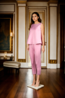Elegant Baby Pink Foam Plain Top with Round Neckline & Sleeveless, Paired with Formal Straight Pants