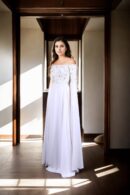 Regal Allure: White Satin Circular Flared Gown with Beaded Illusion Neckline, Net Full Sleeves, Pearl & Sequin Embellishments, and Cowl Draped Front