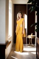 Stunning Yellow Georgette Western Gown with Corset Design, Self-Embroidery Work, Sequins & Gold Lace Details ? Perfect for Weddings & Special Occasions