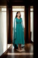 Elegant Green Net Lehenga with Beaded Waist Belt, V-Neckline & Long Cape Sleeves - Perfect for Weddings & Festive Celebrations