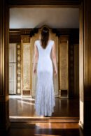 White Net Gown with Abstract Sequin Design & V-Neckline - Perfect for Sophisticated Evenings