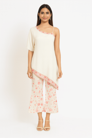 Luxurious White Satin Indo-Western Dress with Colorful Embroidery & Sequin Work, One-Shoulder Sleeveless Design, Knee-Length, and Embroidered Straight Plazo with Side Zip Perfect for Festive Occasions